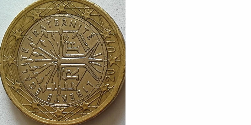 Fig. 19. Image from camera without ocular and tube. 1 Euro coin. Hand-held snapshot, camera propped up on a book (5 cm high), diffuse ambient lighting.