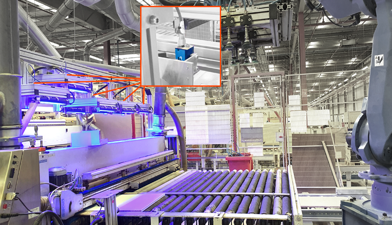 Five-camera automated visual inspection system for a large furniture manufacturer uses DMK33GX264 GigE industrial cameras and HALCON to inspect for the presence of drill holes on flat-pack furniture pieces.